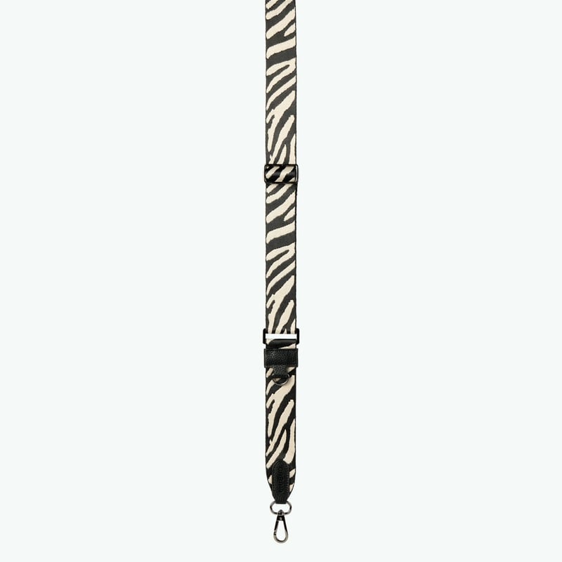 Détail de la bandoulière ajustable et de la boucle